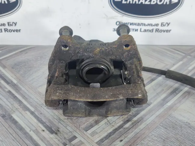 Суппорт левый задний Land Rover Sport L320