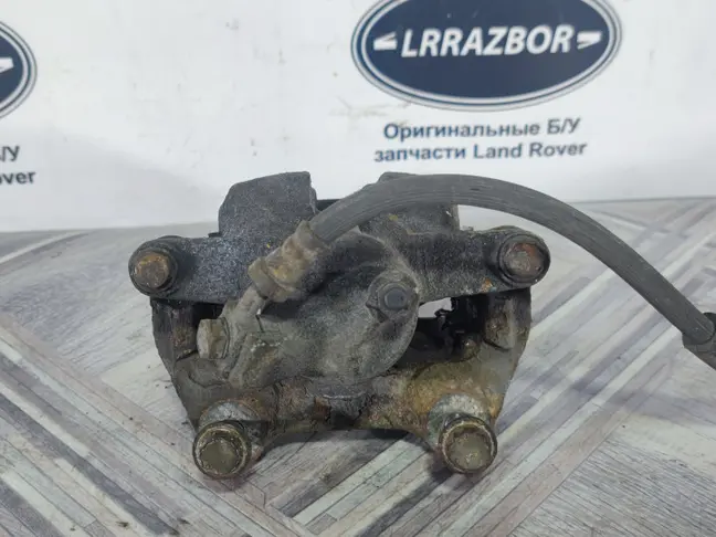 Суппорт левый задний Land Rover Sport L320