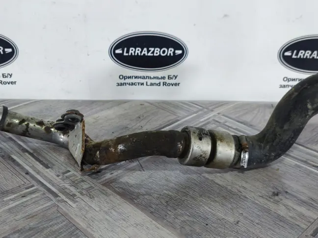 Патрубок турбины левый Range Rover L320 3.6