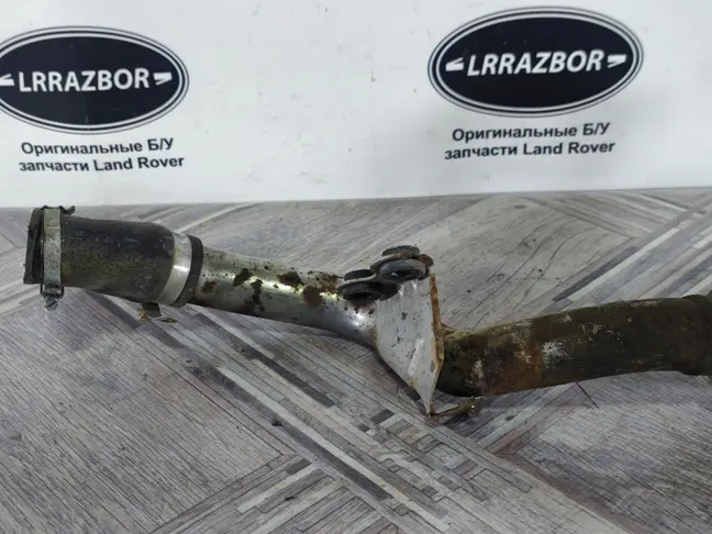 Патрубок турбины левый Range Rover L320 3.6
