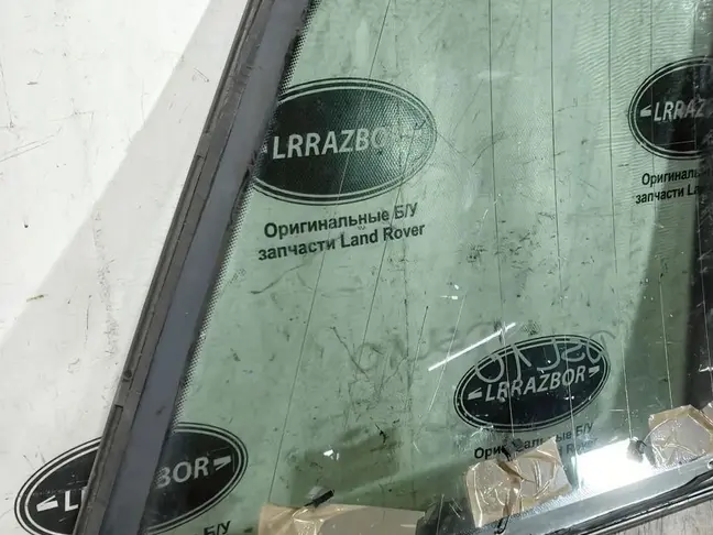 Стекло кузовное глухое левое Range Rover L322