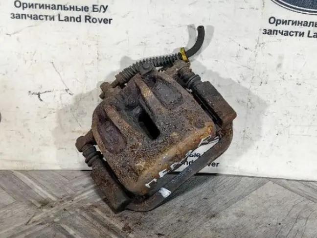 Суппорт тормозной передний правый DISCOVERY 3 L319