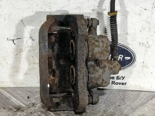 Суппорт тормозной передний правый DISCOVERY 3 L319