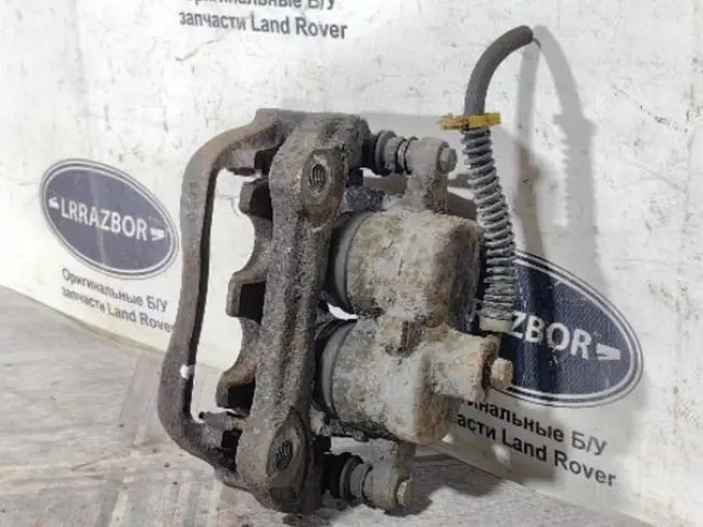 Суппорт тормозной передний правый DISCOVERY 3 L319