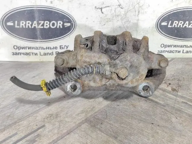 Суппорт тормозной передний правый DISCOVERY 3 L319