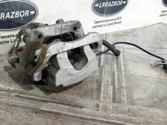 Суппорт задний левый Range Rover L494 306DT 3.0