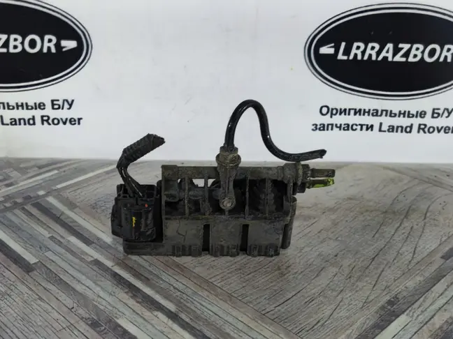 Блок клапанов задний DISCOVERY 3/4 L319 05-15