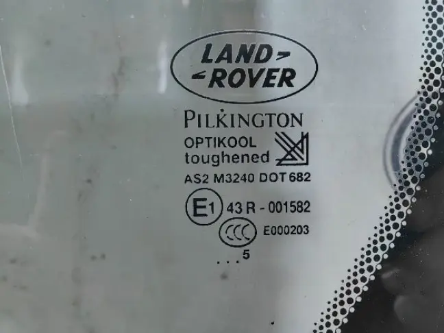 Стекло кузовное глухое левое DISCOVERY 3/4 L319