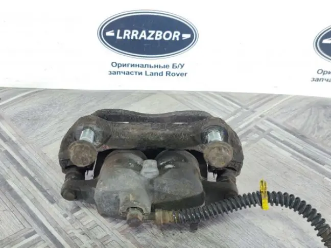 Суппорт тормозной передний правый DISCOVERY 3 L319