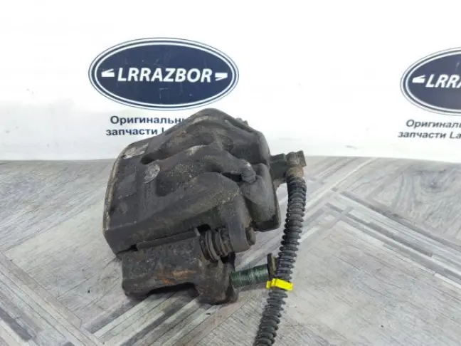 Суппорт тормозной передний правый DISCOVERY 3 L319