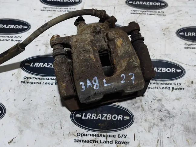 Суппорт тормозной задний левый DISCOVERY 3 L319