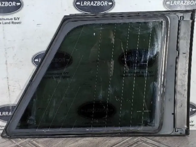 Стекло кузовное глухое левое Range Rover L322 02+
